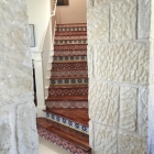Talavera risers with solid Mesquite Treads Epic Flooring