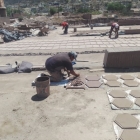 Pressing the Saltillo natural clay into the mold